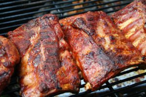 BBQ Ribs cooking on grill