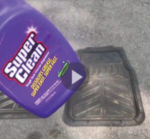 Rubber Floor Mat on ground with bottle of Super Clean