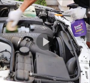 Car engine being degreased with Super Clean