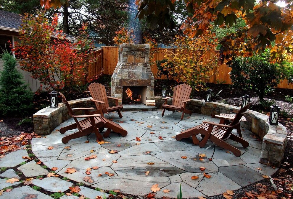 Cement patio with furniture and fall leaves