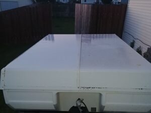 camper topper half cleaned with super clean