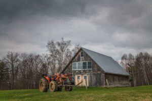 Old barn and tractor on farm