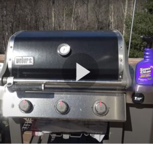 Still of video of propane grill with Super Clean bottle